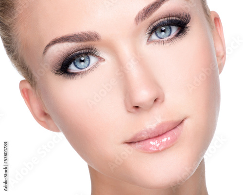 Photo: portrait of beautiful white woman with long false eyelashes portrait of beautiful white woman with long false eyelashes