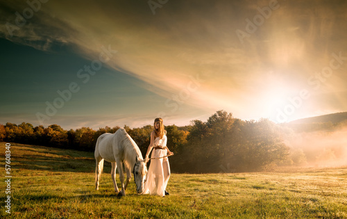 Photo: Beautiful sensual women with white horse Beautiful sensual women with white horse