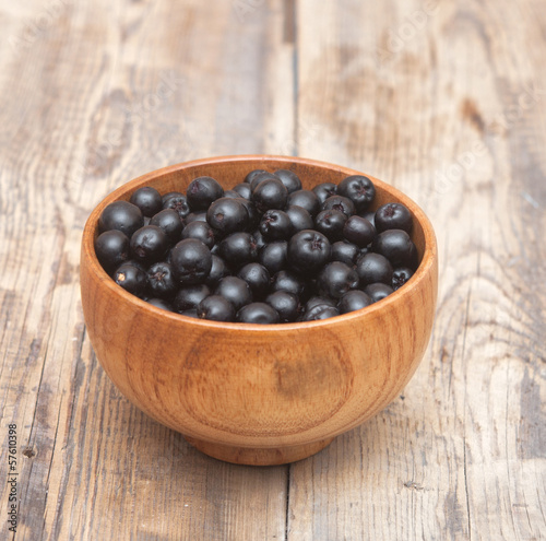 Photo: Chokeberry (Aronia ) on the Table Chokeberry (Aronia ) on the Table
