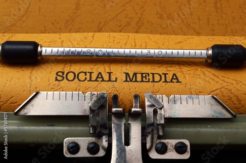 Photo: Social media text on typewriter concept Social media text on typewriter concept