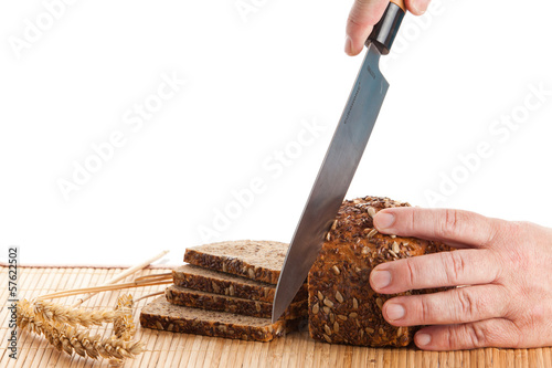 Photo: whole grain bread isolated on white background. whole grain bread isolated on white background.