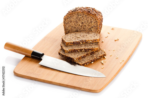Photo: whole grain bread isolated on white background. whole grain bread isolated on white background.