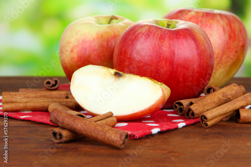 Photo: Ripe apples with with cinnamon sticks Ripe apples with with cinnamon sticks