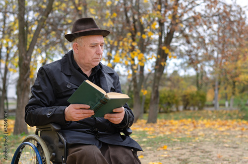 Photo: Handicapped elderly man in a wheelchair Handicapped elderly man in a wheelchair