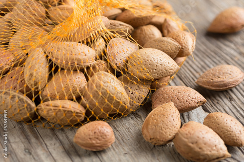 Photo: Whole almonds in plastic net bag Whole almonds in plastic net bag