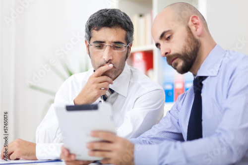 Photo: Couple of businessmen working together Couple of businessmen working together