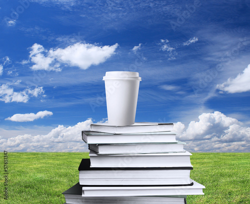 Photo: book and cup of coffee book and cup of coffee
