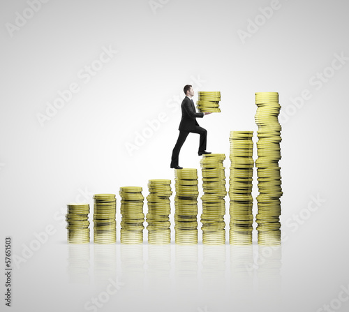 Photo: businessman climbing up businessman climbing up