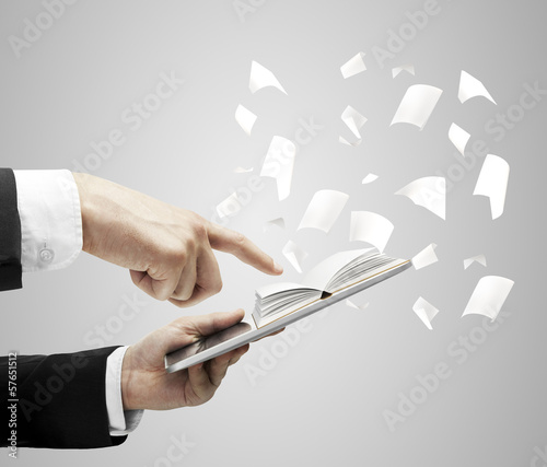 Photo: tablet with open book tablet with open book