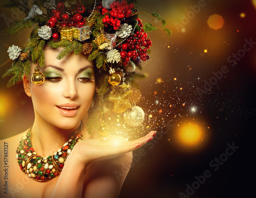 Photo: Christmas Winter Woman with Miracle in Her Hand Christmas Winter Woman with Miracle in Her Hand