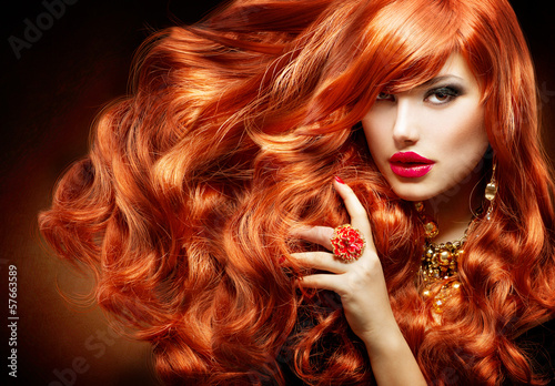 Photo: Long Curly Red Hair. Fashion Woman Portrait Long Curly Red Hair. Fashion Woman Portrait