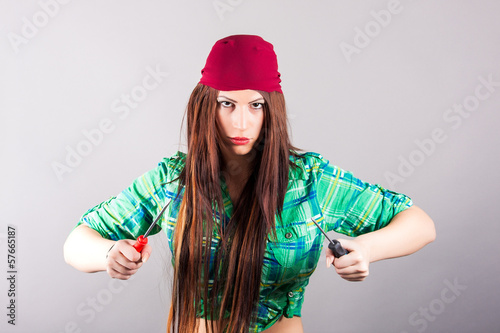 Photo: young sexy girl with screwdrivers young sexy girl with screwdrivers