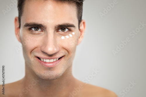 Photo: Man with anti- aging cream Man with anti- aging cream