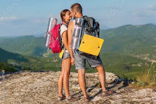 Photo: Two backpackers in mountains. Two backpackers in mountains.