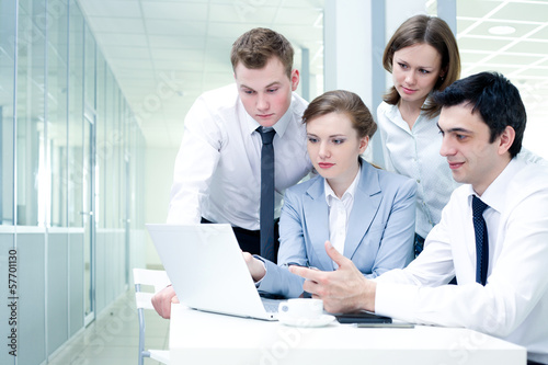Photo: Teamwork in the office Teamwork in the office