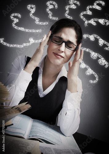 Photo: Woman having headache. Woman having headache.