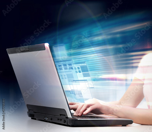 Photo: Hands with laptop computer. Hands with laptop computer.