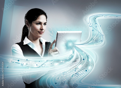Photo: Woman with tablet computer. Woman with tablet computer.