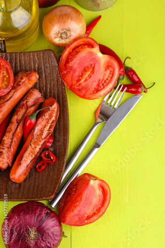 Photo: Delicious sausages with vegetables Delicious sausages with vegetables