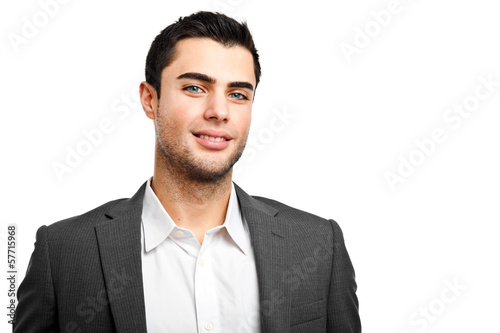 Photo: Smiling businessman isolated on white Smiling businessman isolated on white