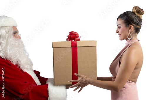 Photo: Santa Claus delivers the gift Santa Claus delivers the gift