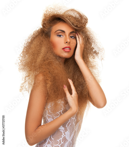 Photo: woman with long curly hair woman with long curly hair