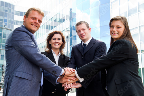 Photo: Business people joining hands Business people joining hands