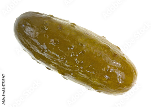 Photo: A large dill pickle on a white background A large dill pickle on a white background