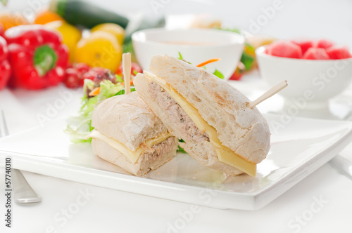 Photo: tuna and cheese sandwich with salad tuna and cheese sandwich with salad