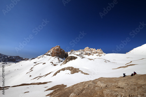 Photo: Two hikers on halt in snowy mountain Two hikers on halt in snowy mountain