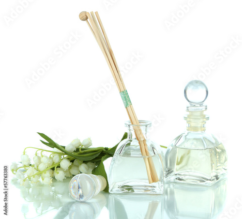Photo: Room air refreshers with flowers isolated in white Room air refreshers with flowers isolated in white