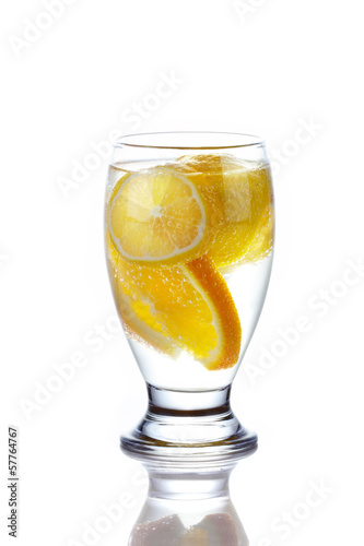Photo: Sliced orange and lemon in glass of wate Sliced orange and lemon in glass of wate
