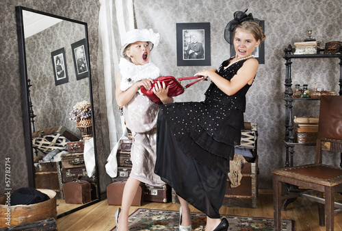 Photo: Little girls Having Argument for handbag Little girls Having Argument for handbag