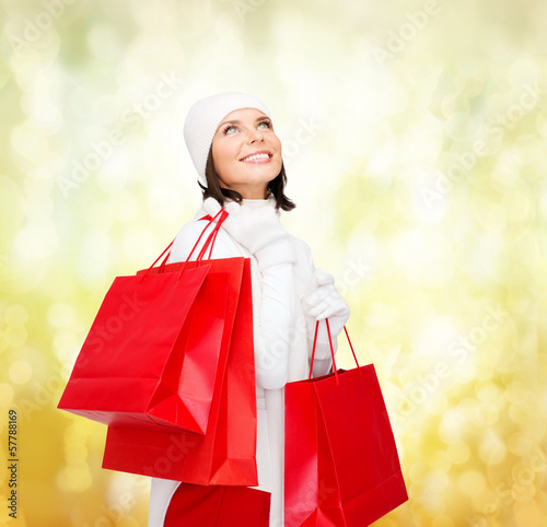 Photo: picture of happy woman with shopping bags picture of happy woman with shopping bags
