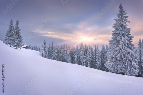 Photo: Beautiful winter landscape in the mountains. Sunset Beautiful winter landscape in the mountains. Sunset