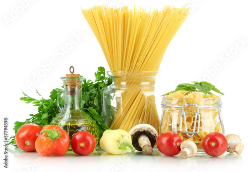 Photo: Different types pasta with vegetables isolated on white Different types pasta with vegetables isolated on white