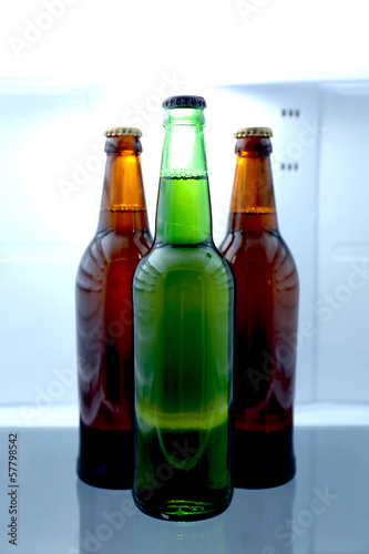 Photo: Bottles with drinks in refrigerator Bottles with drinks in refrigerator