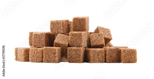 Photo: Cubes of sugar with cinnamon isolated Cubes of sugar with cinnamon isolated
