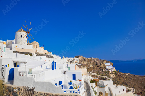 Photo: Windmill in Oia at Santorini island, Greece Windmill in Oia at Santorini island, Greece