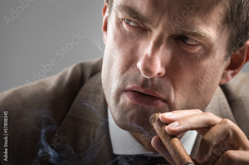 Photo: Severe gaze of elegant smoker Severe gaze of elegant smoker