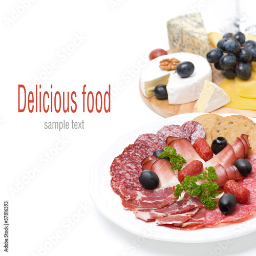 Photo: assorted deli meats and a plate of cheese, isolated assorted deli meats and a plate of cheese, isolated