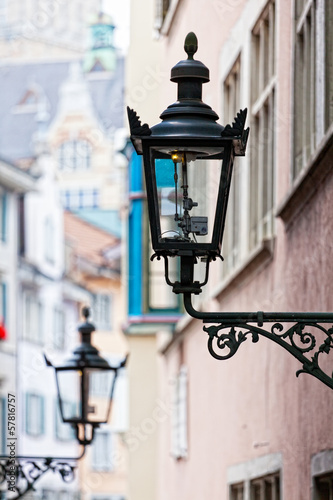 Photo: Decorative lamp on a house wall, Zurich, Switzerland Decorative lamp on a house wall, Zurich, Switzerland