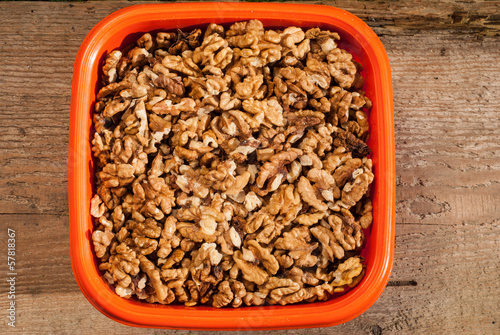 Photo: Walnuts in an orange bowl Walnuts in an orange bowl