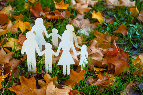 Photo: paper family in autumn grass paper family in autumn grass