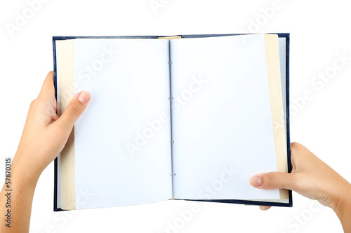 Photo: Book in hands isolated on white Book in hands isolated on white