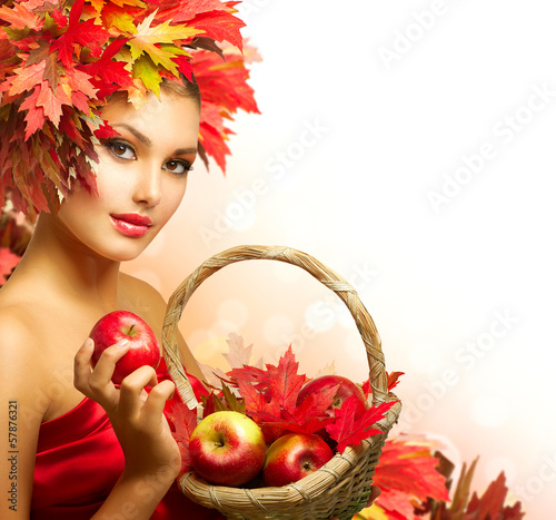 Photo: Beauty Autumn Woman with Ripe Red Organic Apples Beauty Autumn Woman with Ripe Red Organic Apples