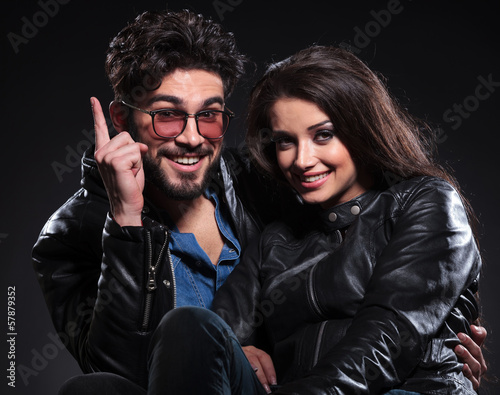 Photo: man is having a great idea and woman smiles man is having a great idea and woman smiles