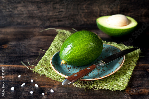 Photo: Avocado on a wooden board Avocado on a wooden board
