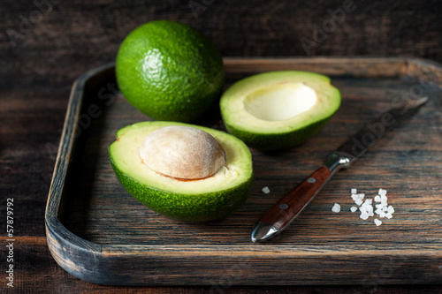 Photo: Avocado in a wooden tray Avocado in a wooden tray