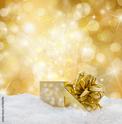 Photo: golden background with present golden background with present